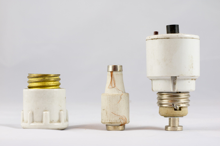 Old electric fuses on white isolated backgroundの写真素材