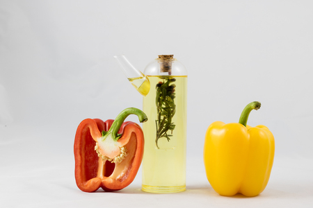 Wonderful Italian food, peppers, tomatoes and olive oil isolated on white backgroundの写真素材
