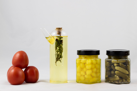 Wonderful Italian food, peppers, tomatoes and olive oil isolated on white backgroundの写真素材