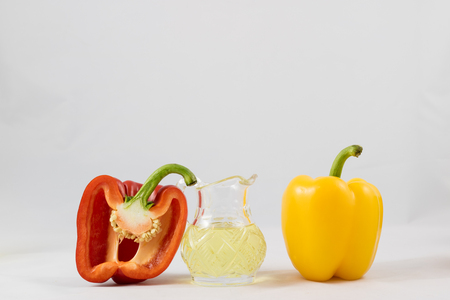 Wonderful Italian food, peppers, tomatoes and olive oil isolated on white backgroundの写真素材