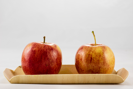 Tasty ripe apples on white isolated backgroundの写真素材