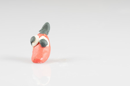 Plasticine figures, children's play, fairy-tale characters, white backgroundの写真素材