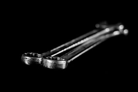 Rusty, old workshop keys. Hydraulic keys on a black table in a workshop.の写真素材