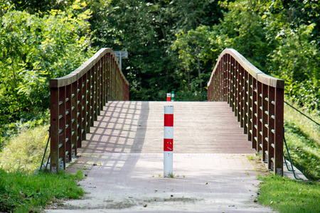 Bridge over the lake, river. Beautiful autumn season. September season.の写真素材