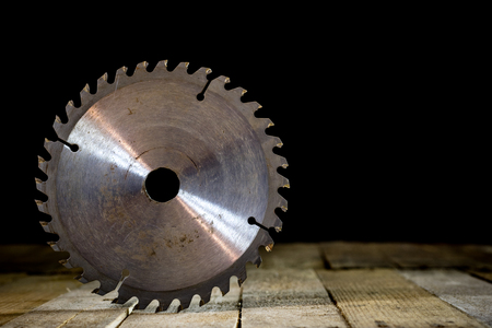 Old good carpentry, tools drill bit. Wooden carpentry table and old good carpentry tools on it. Black background.の写真素材