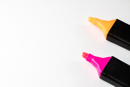 Highlighter on a white background. Office Mazaki to the sketch lie on a white countertop. White...