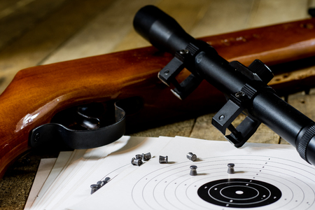 shooting, pneumatic weapon with shield and shotgun at the shooting rangeの写真素材