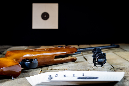 shooting, pneumatic weapon with shield and shotgun at the shooting rangeの写真素材