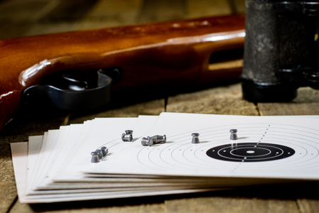 shooting, pneumatic weapon with shield and shotgun at the shooting rangeの写真素材