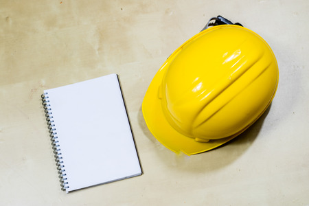 helmet, hearing protection, tools, workshop table. Safety equipment and tools.の写真素材