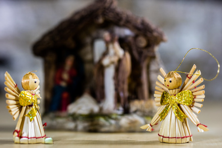 Christmas decorations for Christmas. Christmas ornaments made of straw. Decorations on a wooden...