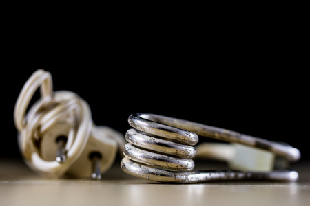 Heating water in a glass after mustard. The old method of brewing tea. Black background.の写真素材