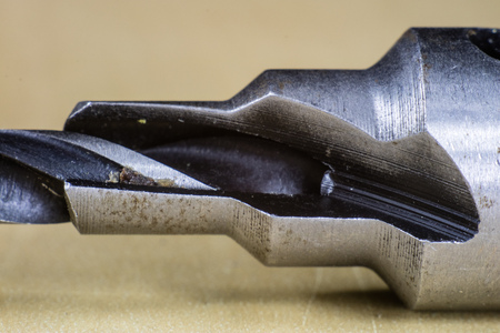 Joinery accessories in a large magnification. The tip of the drill is shown in macro technology....