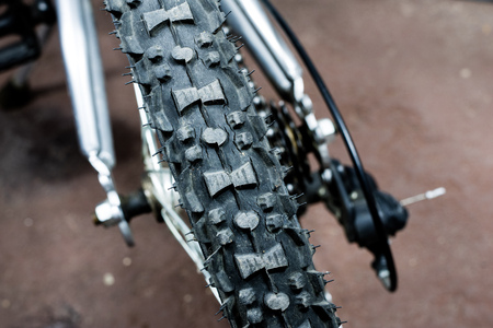 Kids bike. Shock absorber, brake, wheel shown close up. Bike accesories.の写真素材