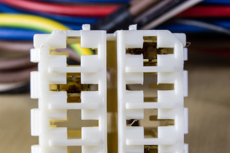 Electrical connectors at high magnification. Computer and electrical clamps and plugs shown in macro...
