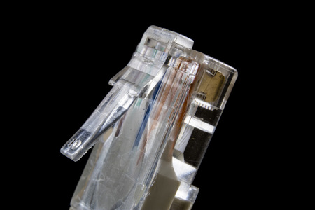 Electrical connectors at high magnification. Computer and electrical clamps and plugs shown in macro...