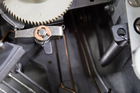 Typewriter shown in macro technology. A mechanical device for printing text. Light background.の写真素材