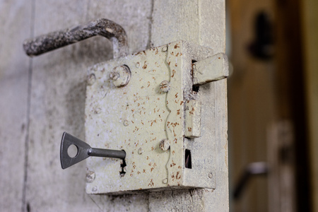 Keys to the front door of the house. Various accessories needed to protect your home from theft. Light background.の写真素材