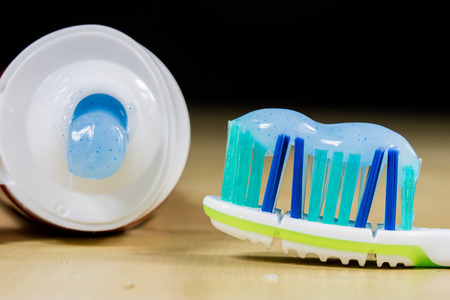 A new toothbrush. Toothpaste arranged on the bristles of a toothbrush for brushing and brushing...