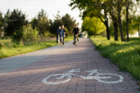 Bicycle path with horizontal marking. Designated place for cycling. Spring time.の写真素材