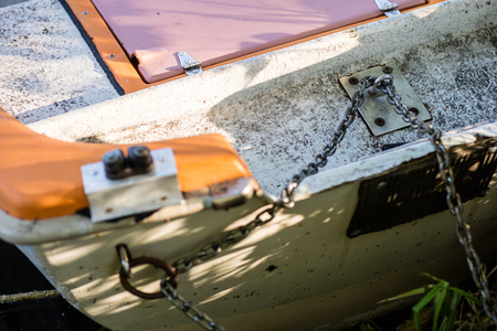 Capstan on a small sailing boat. Equipment for a sailing boat floating in inland waters. Season of the spring.の写真素材