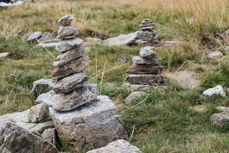 Stones stacked on top of a mountain. The summit in central europe. Season of the summer.の写真素材