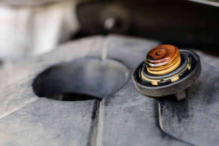 Oil filler for the car engine. Replenishing liquids in the drive unit. Place - car workshop.の写真素材