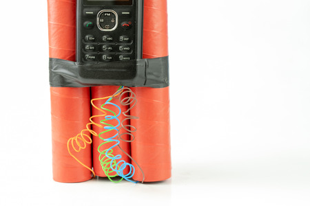 Dynamite sticks with time igniter. Explosive material with ignition connected to a mobile phone....