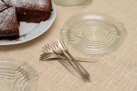 Prepared dessert in a family home. Family meeting at the kitchen table. Light background.の写真素材