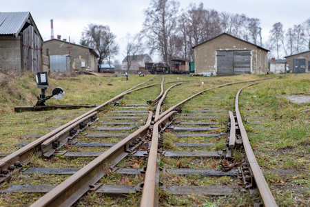Old narrow-gauge railway tracks. Roundhouse in Central Europe. Season winter.の写真素材
