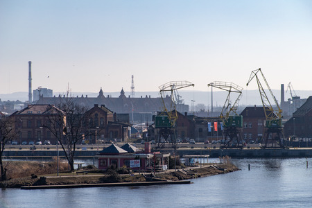 Szczecin, Pomorskie / Poland - February, 27, 2019: Port of Szczecin (Oder). Harbor buildings in northern Poland. Season of the spring.のeditorial素材