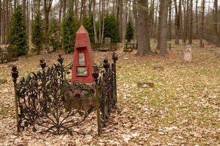 Borne Sulinowo, zachodniopomorskie / Poland - March, 21, 2019: Old Soviet Cemetery in a former military base in Poland. Tombs of Soviet soldiers. Season of the spring.のeditorial素材