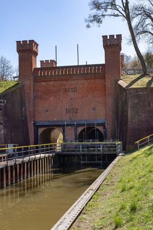 Biala Gora, pomorskie / Poland - April, 16, 2019:. The construction of the hydrological tower. Sluice regulating the water level in the Central Europe. Season of the spring.のeditorial素材