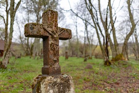 Wolosate, Malopolskie / Poland - April, 28, 2019: Old cemetery in a village in the mountains. Burial place in a small village. Season of the spring.のeditorial素材
