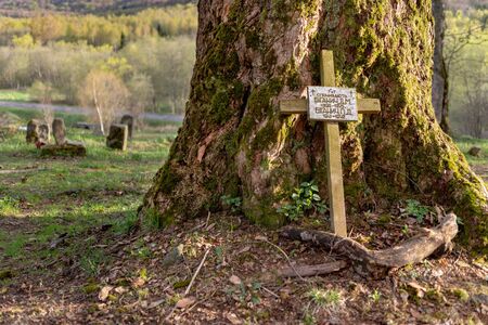Wolosate, Malopolskie / Poland - April, 28, 2019: Old cemetery in a village in the mountains. Burial place in a small village. Season of the spring.のeditorial素材