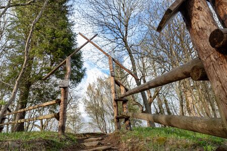 Wolosate, Malopolskie / Poland - April, 28, 2019: Old cemetery in a village in the mountains. Burial place in a small village. Season of the spring.のeditorial素材