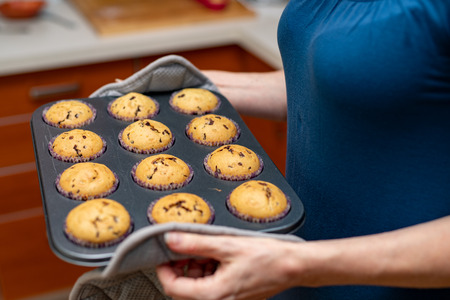 Tasty fresh rolls in a mold kept by housewives. Delicious homemade items straight from the oven....