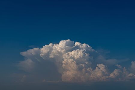 Beautiful clouds during a lot of heat. Delicate clouds in the sky at high air temperature. Season of the summer.の写真素材