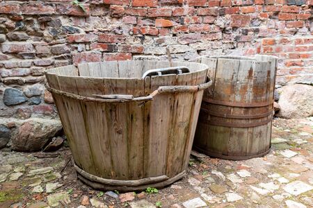Wooden tub for washing underwear. Wooden bathtub for everyday use. Place - open-air museum.