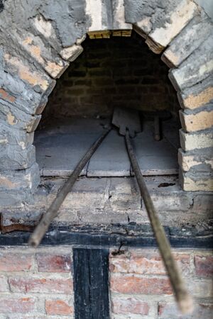 Brick oven for baking bread. The old method of baking a cake. Place - open-air museum.