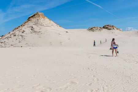 Leba, Pomeranian Voivodeship / Poland - July 14, 2019: Large sand dunes in Central Europe. A spit between the Baltic Sea and the lake. Season of the summer.のeditorial素材