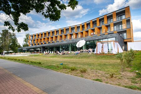Charzykowy, Pomeranian Voivodeship / Poland - July 20, 2019: Marina and moored sailboats at the lake harbor. Sailing port in Central Europe. Season of the summer.のeditorial素材