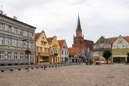 Trzebiatow, zachodniopomorskie / Poland - August, 17, 2019: Old buildings on the market square....