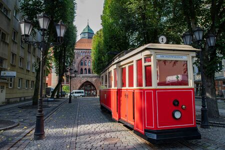 Slupsk, Pomeranian / Poland - September, 27, 2019: Old historic tram in the city of Slupsk. A monument in the soft park. Autumn season.のeditorial素材