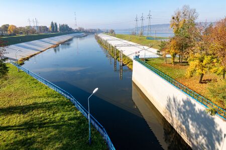 Wloclawek, Kujawskopomorskie / Poland - October, 23, 2019: Concrete dam on a large river in Central Europe. Hydroelectric power plant in Wloclawek. Autumn season.のeditorial素材