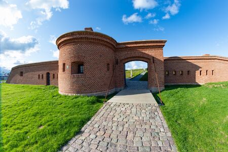 Kolobrzeg, zachodniopomorskie / Poland - October, 30, 2019: Bagna Reduta in KoÅobrzeg. Brick fort in Central Europe. Autumn season.のeditorial素材