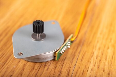 Small electric motor and plastic modes. Spare parts used in electronic devices. Place - workshop.