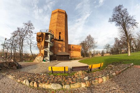Kruszwica, kujawsko pomorskie / Poland - December, 17, 2019: Ruins of the late Gothic castle with the remaining Mouse Tower. Old stronghold built of red brick. Season Autumn.のeditorial素材