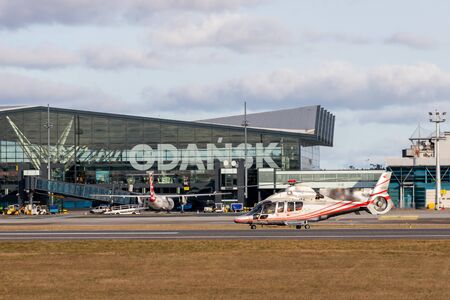 Gdansk, Pomeranian / Poland - February, 05, 2020 :. Gdansk airport in Pomerania. A helicopter taking off from an airport apron. Spring season.のeditorial素材