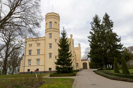 Mierzecin, lubuskie / Poland - March, 12, 2020: Beautiful well-kept palace in Central Europe. An exclusive hotel in an old palace. Spring season.のeditorial素材